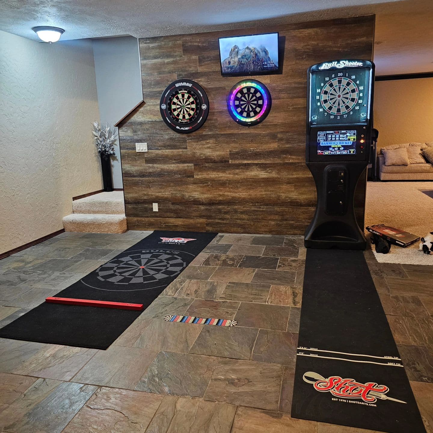Finished the dart wall by adding a Winmau Blade 6, surround, Bull's throw rug with raised oche, and the Bully Boy Michael Smith Shot Tenacious 24-gram steel tip darts. Merry Christmas to me! Thanks babe! 😘 chelsmslendy 

#darts #winmaudarts #blade6 #winmaublade6 #winmausurround #shotdarts #michaelsmith #bullyboy #steeltip #dartshopper #stillsuck #granboard #granboard3 #bullshooter #galaxy3 #bullshootergalaxy3 #softtipdarts #sponsorship